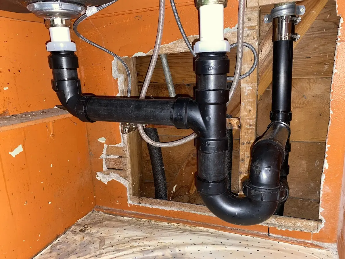 Professional Garbage Disposal Repair equipment and tools on the job in Brookfield